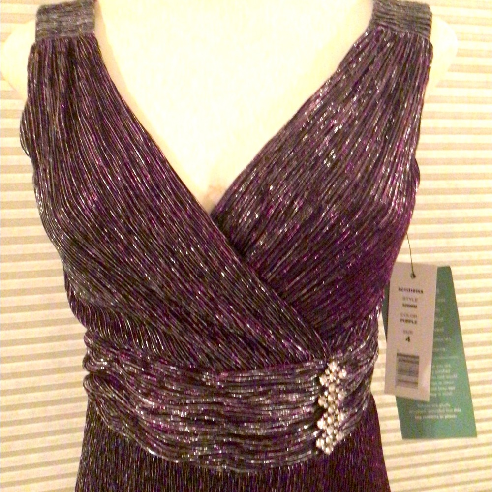 Full-length gown, size 4, “Mardi Gras” never worn